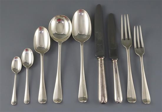 A 1970s canteen of Garrard & Co hanovarian rat tail pattern cutlery for twelve, weighable silver 134.5 oz.